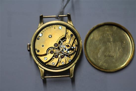 A gentlemans mid size 1930s? 18ct gold manual wind Longines wrist watch, no strap.